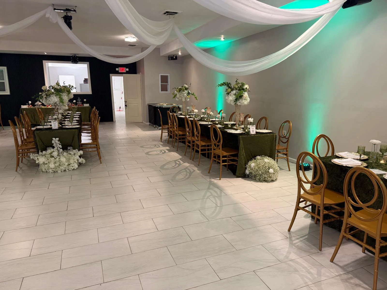 A welcoming celebration arrangement inside Continental event hall