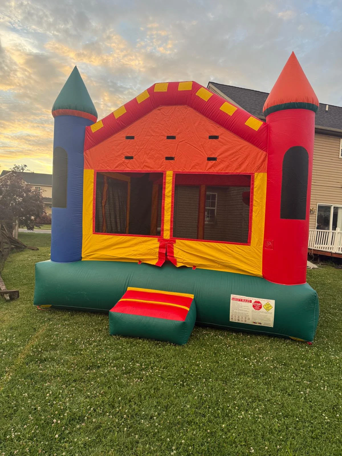 Colorful bouncy house available for rental.